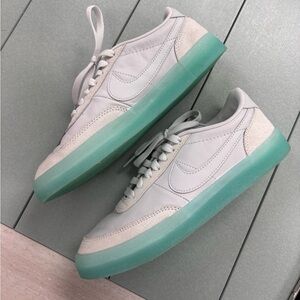 Women’s Nike Shoe with Teal Bottom